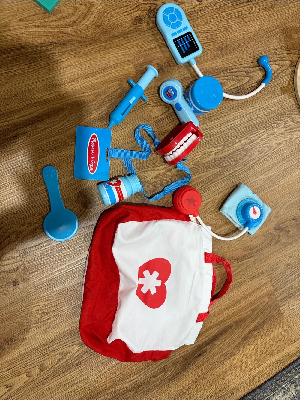 Melissa & Doug Red and Blue Doctor Role-Play Backpack Set